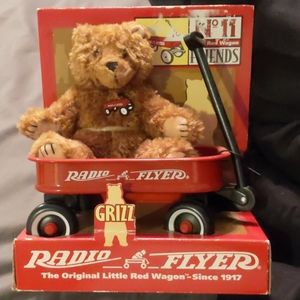 Small Teddy bear in red wagon: Grizz Radio Flyer